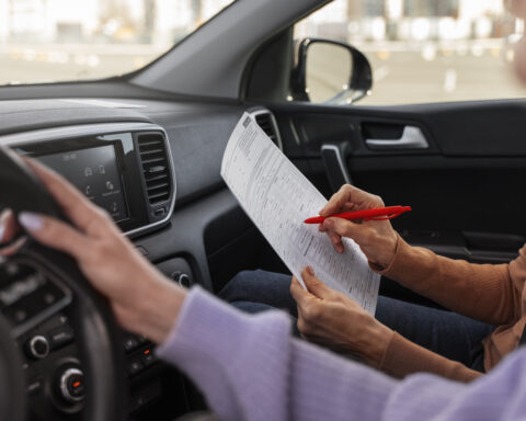 Woman taking her driver s license test vehicle
