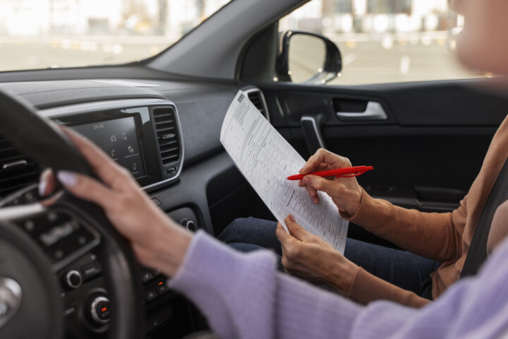 Woman taking her driver s license test vehicle